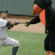 Illustration for article titled Curtis Granderson And The Orioless Mascot Shared A Moment This Afternoon